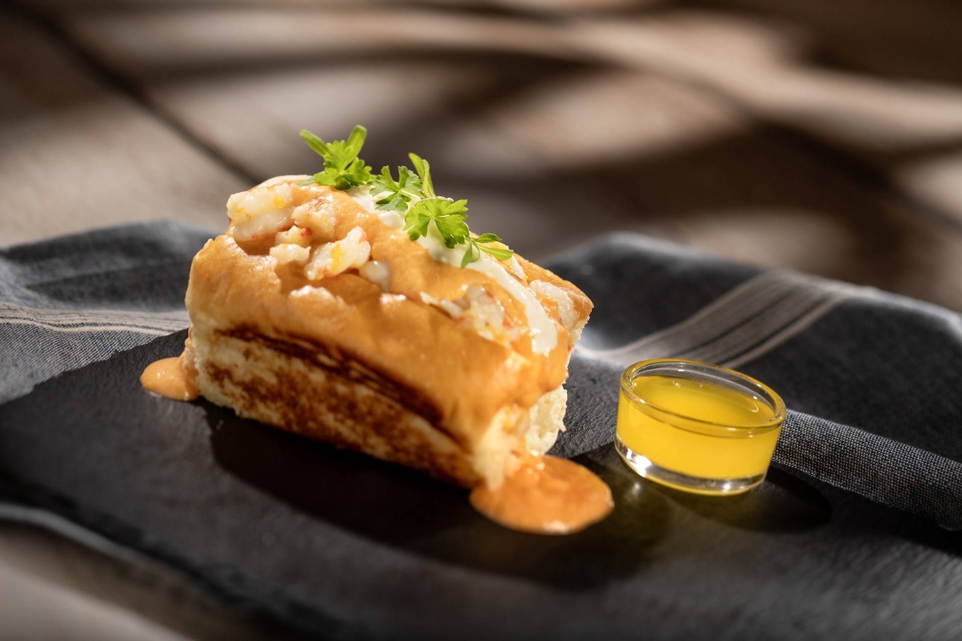 Gulf Coast Style Seafood Roll with Warm Water Lobster Rock Shrimp Lobster Bisque