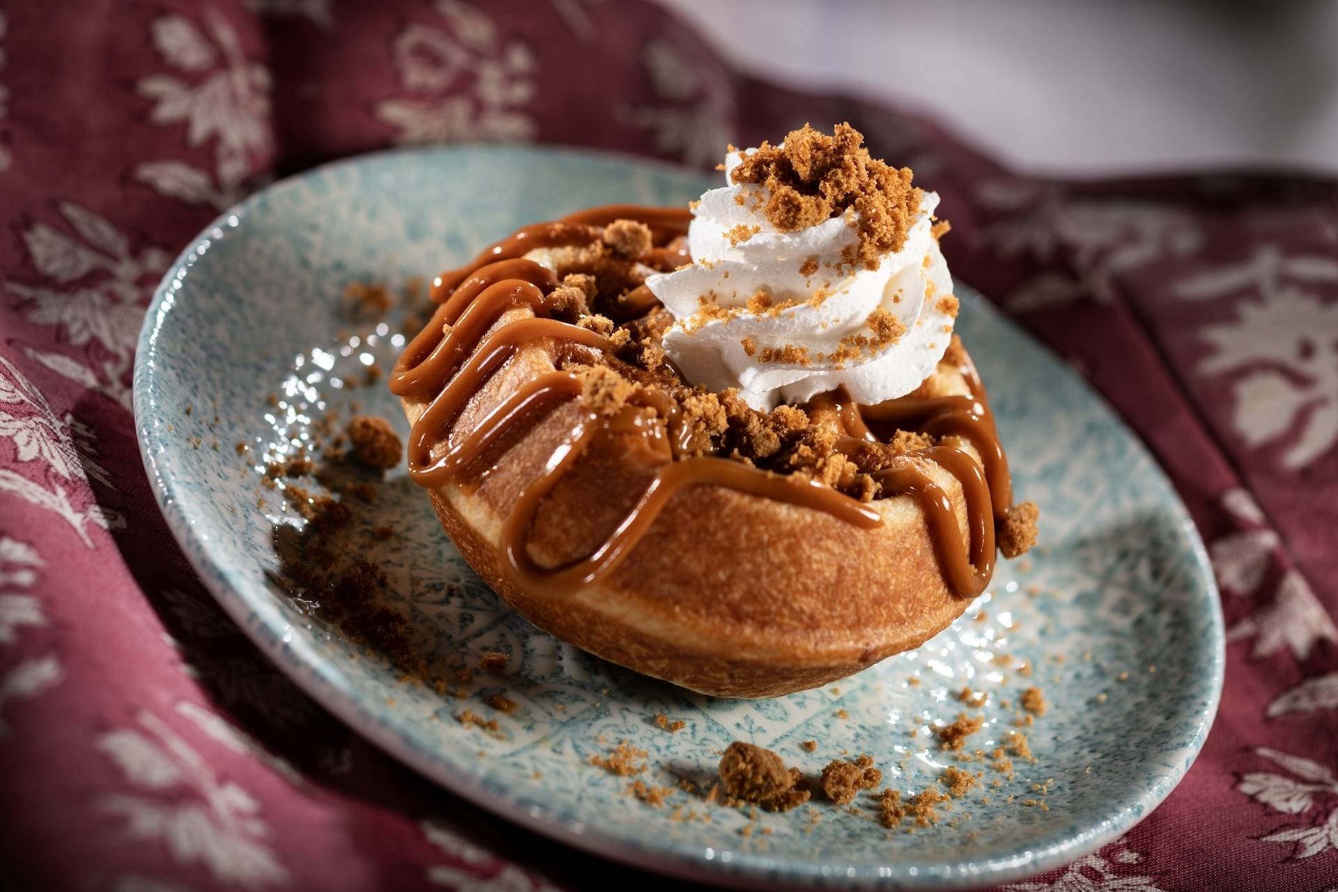 Belgian Waffle with Cookie Butter and Whipped Cream Topped with Speculoos Cookie
