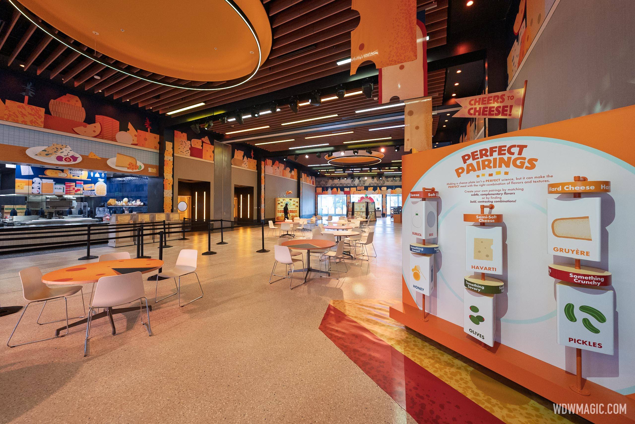 Inside CommuniCore Hall, a "Perfect Pairings" interactive display highlights cheese and food combinations including Gruyère with pickles and Havarti with honey