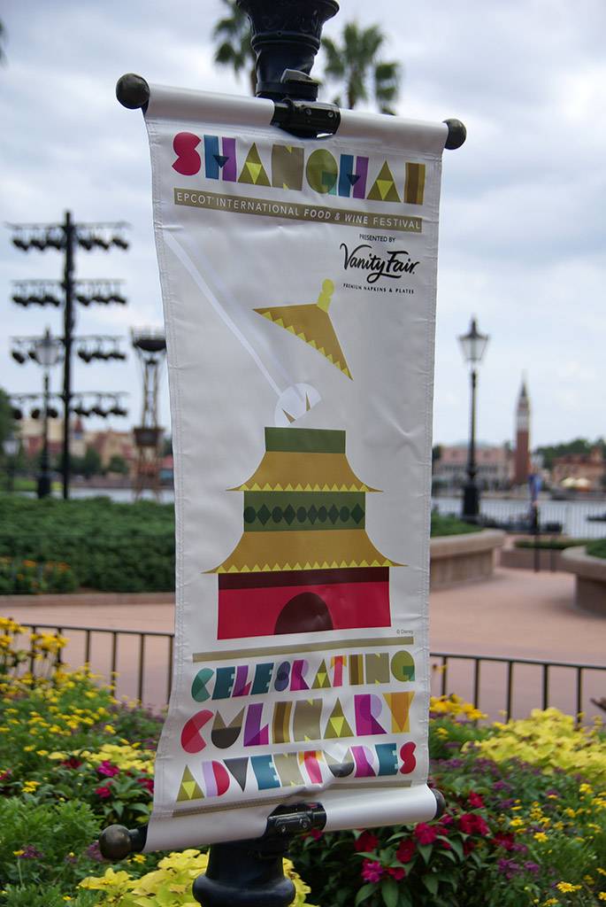 Signage representing the participating regions can be found all over World Showcase