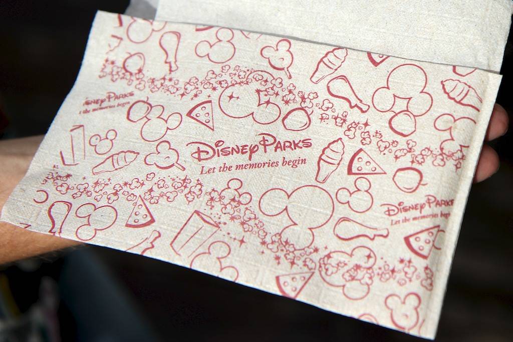 New 'Let the Memories Begin' napkins and cups now in the parks and resorts
