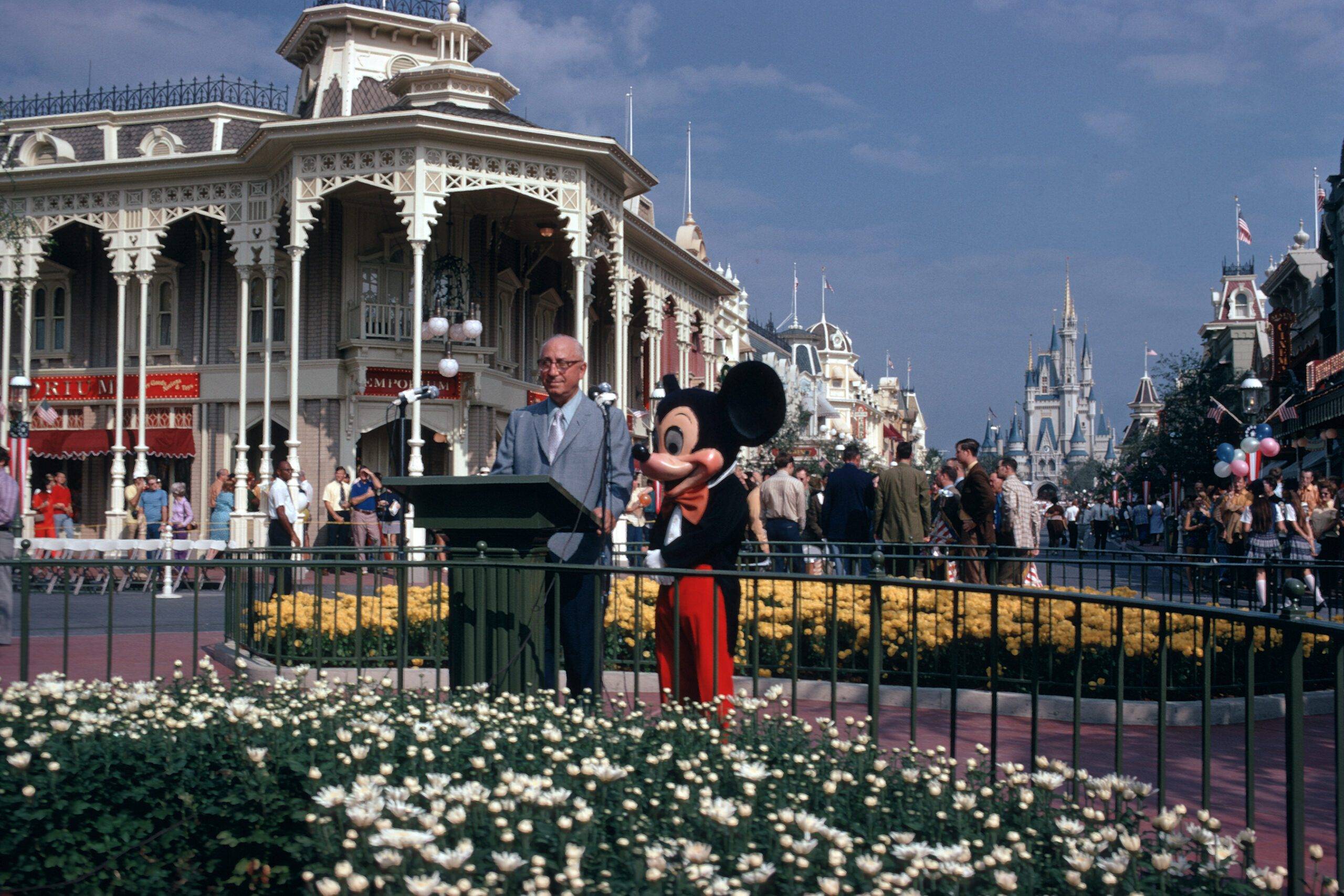 Roy O. Disney and Mickey Mouse at the Oct. 25, 1971, dedication ceremony for Walt Disney World Resort on Main Street, U.S.A., in Magic Kingdom 