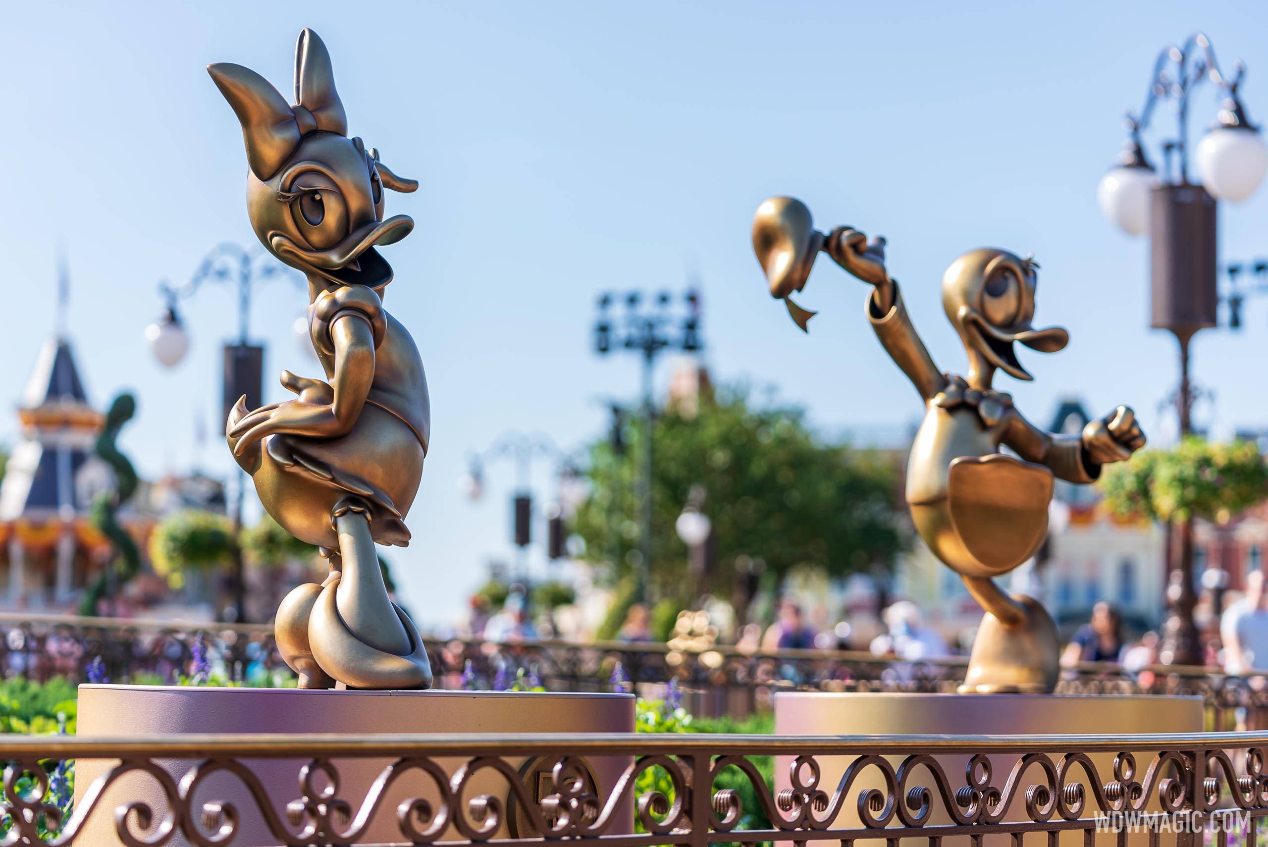 Disney Fab 50 golden character statues at Magic Kingdom