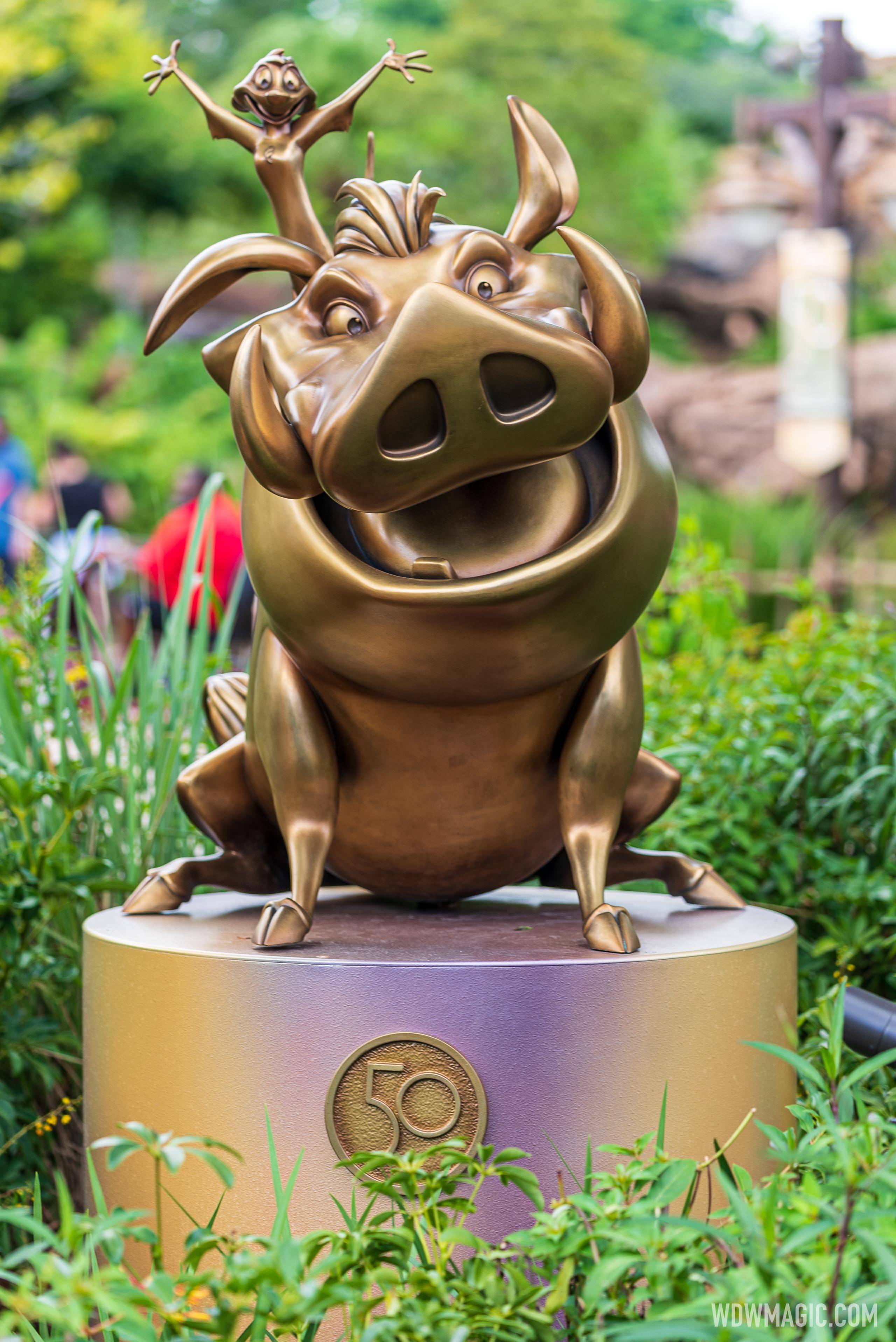 Disney Fab 50 golden character statues at Disney's Animal Kingdom