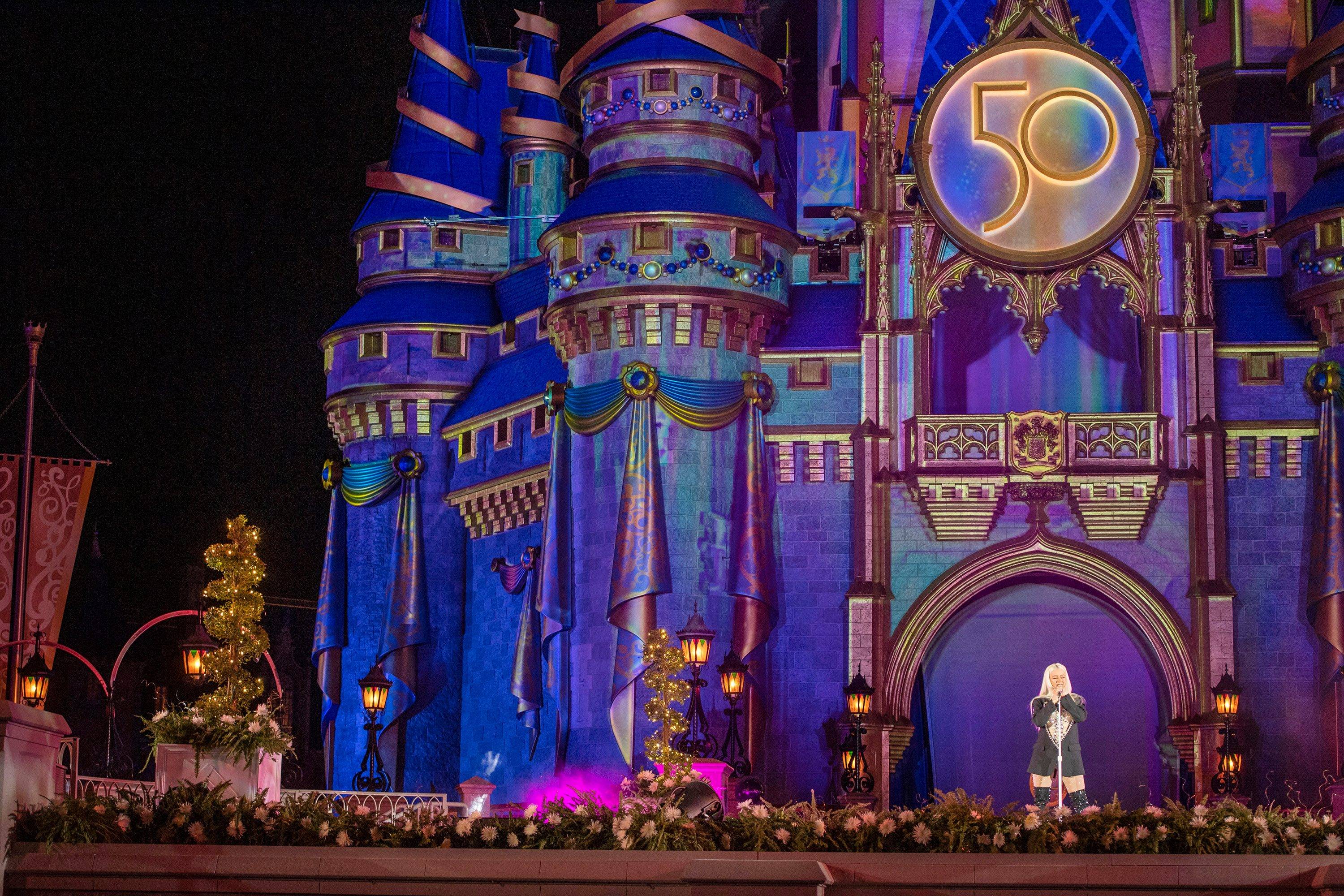 Disney Legend Christina Aguilera performs in front of Cinderella Castle 