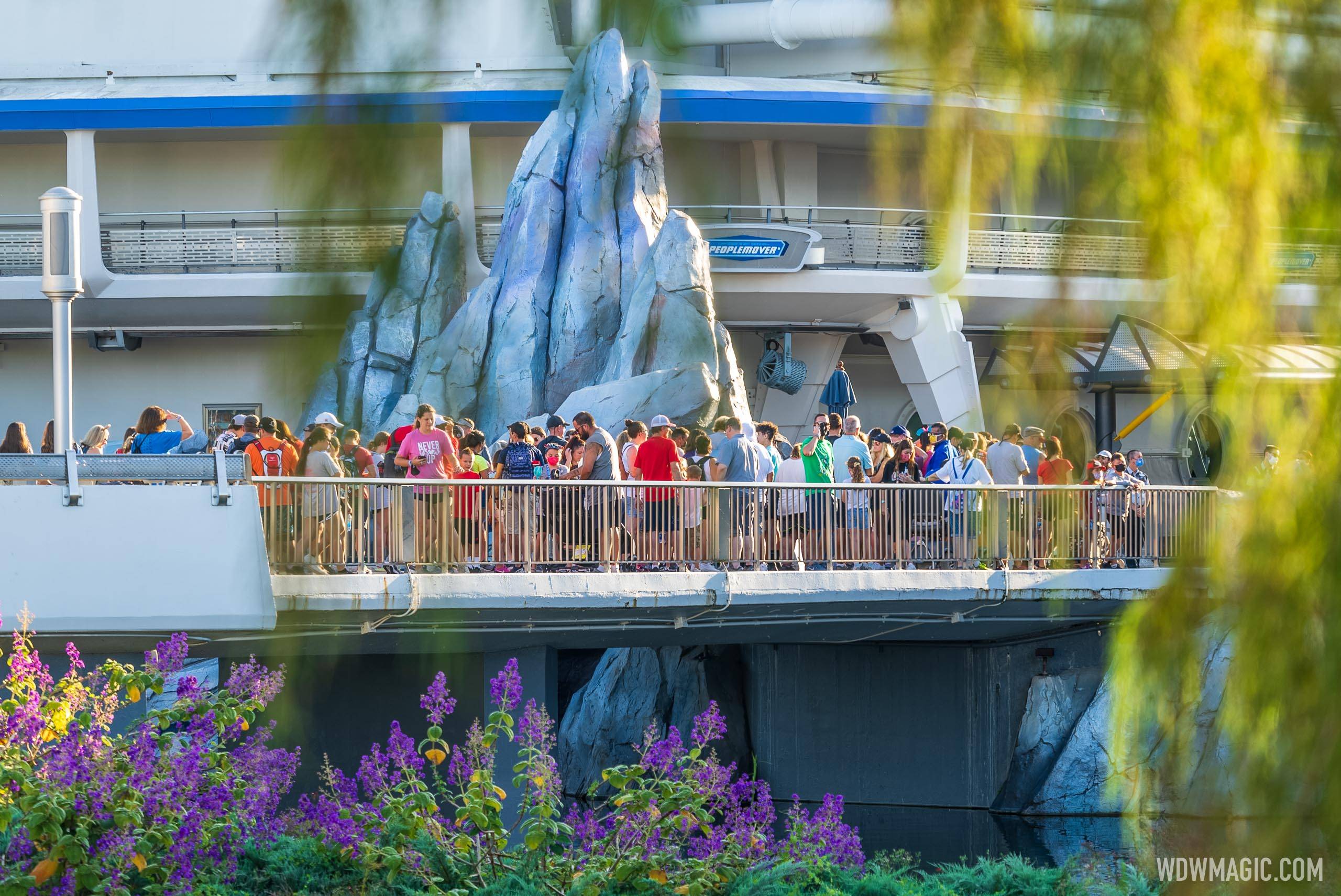 Resort hotel guests waiting at the Tomorrowland Rope drop at 8:25am ahead of the 8:30am rope drop