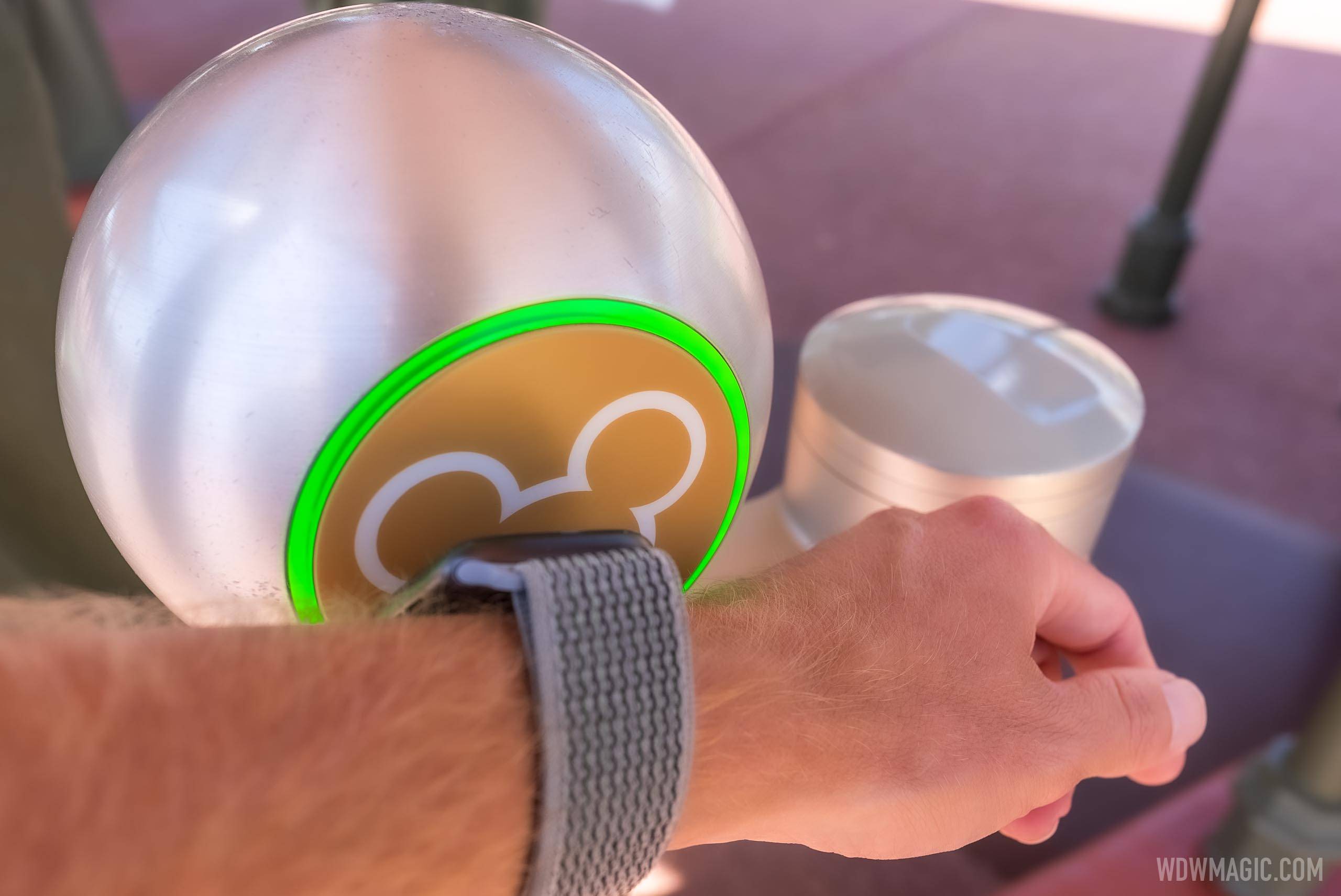 Apple Watch being used at the entrance to Magic Kingdom