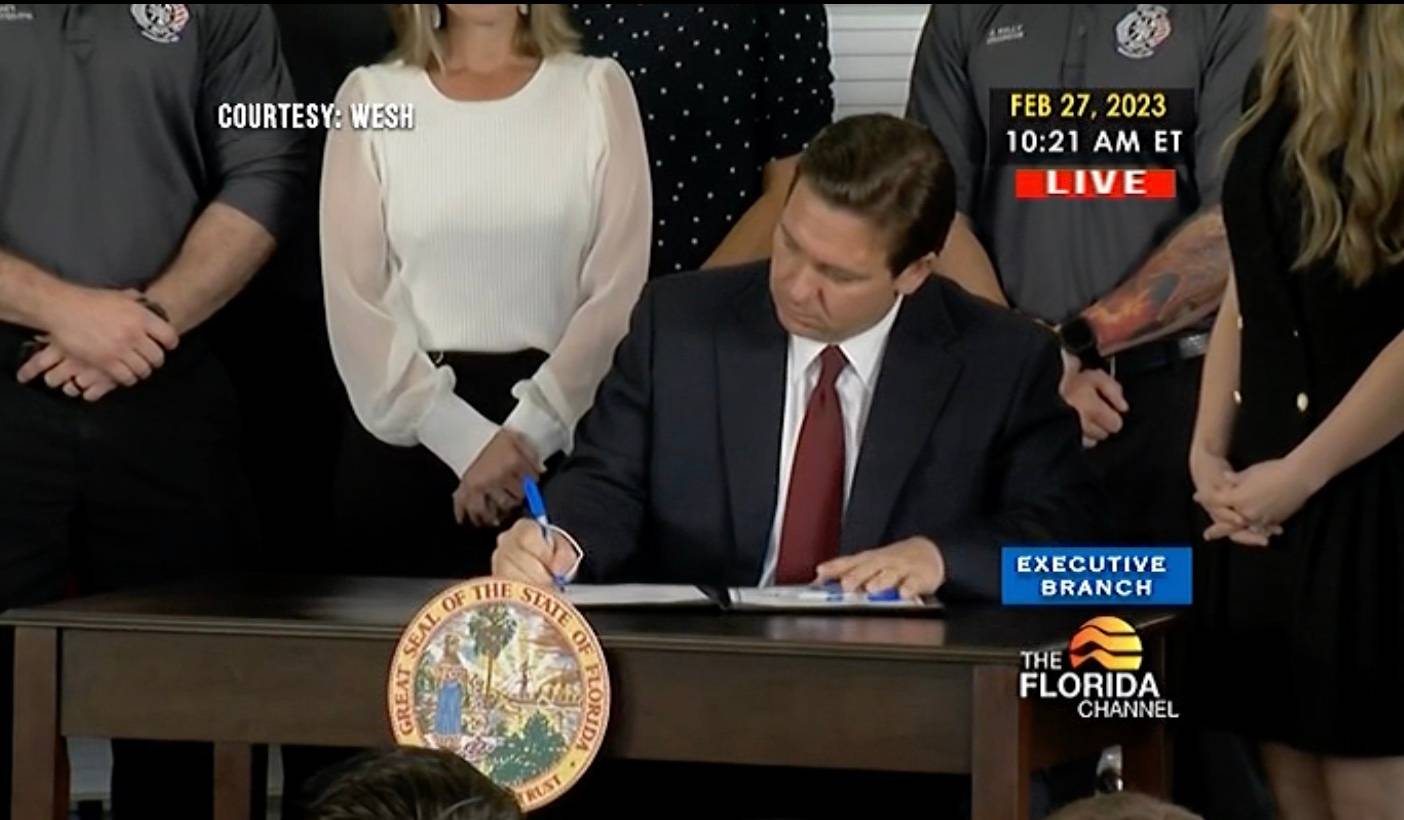 Ron DeSantis earlier this year signing the bill to replace Reedy Creek Improvement District with his hand-picked board
