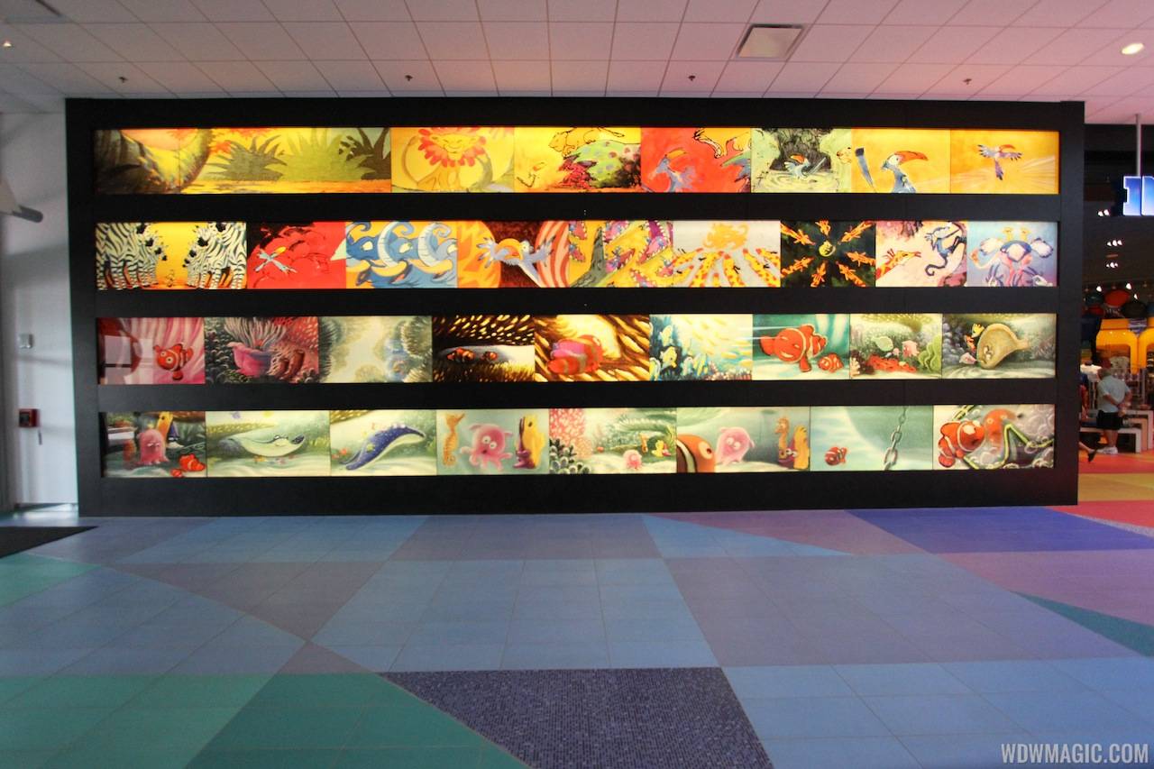 Animation artwork lines the walls of the lobby