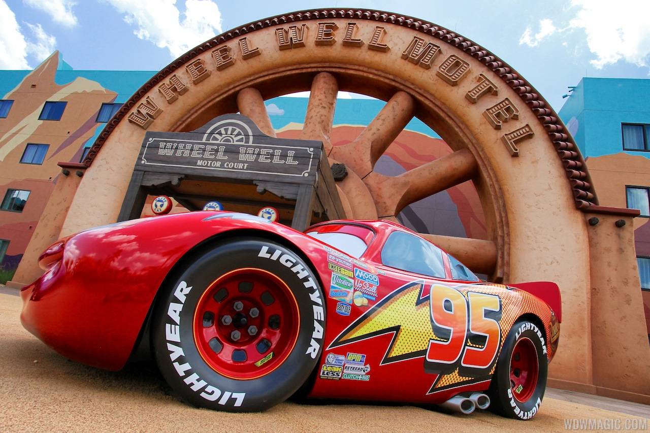 Lightning McQueen in front of the Wheel Well Motel building in Cars section at Disney's Art of Animation Resort