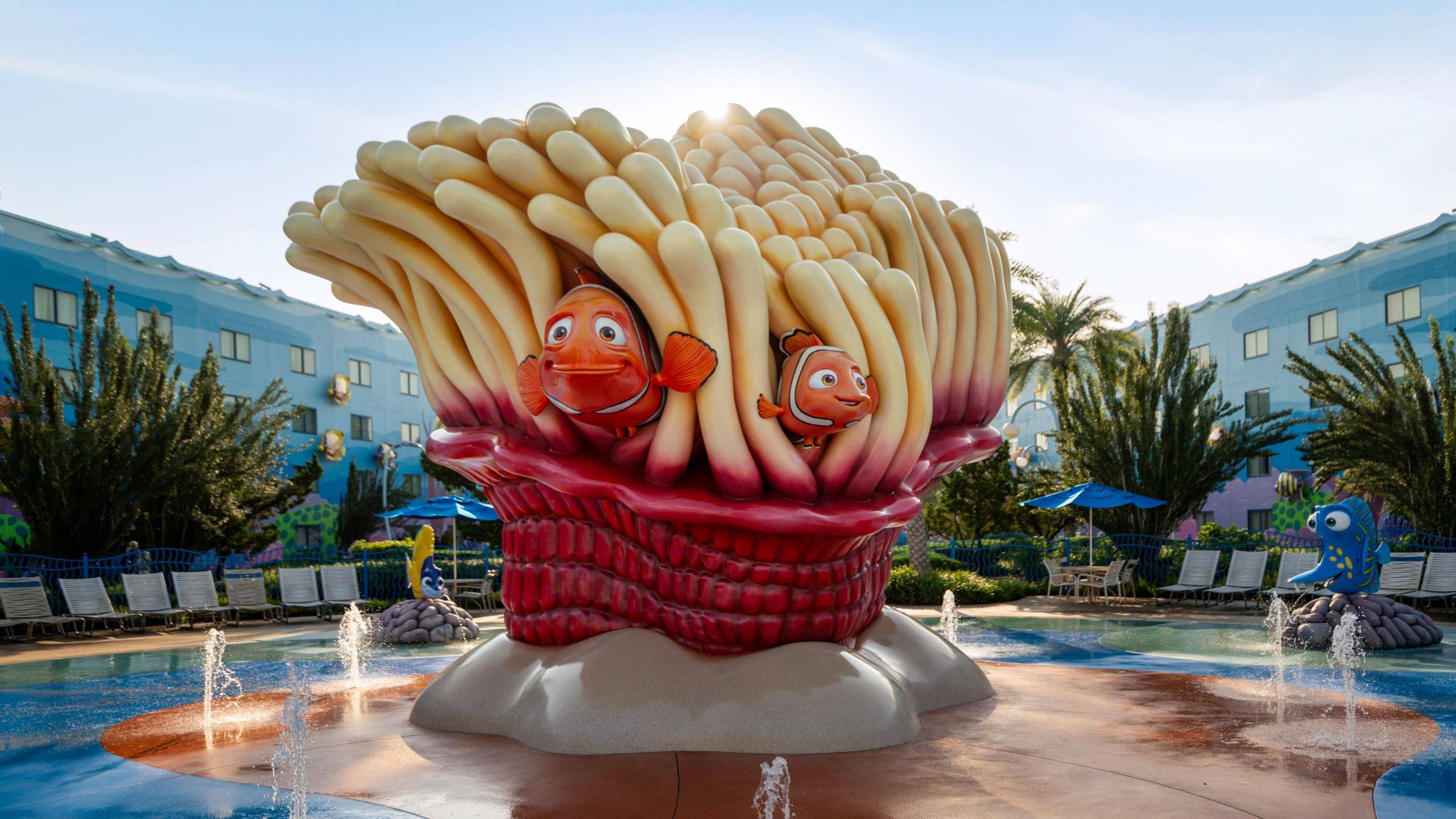 Marlin and Nemo figures nestle inside a giant sea anemone sculpture at the Finding Nemo pool area