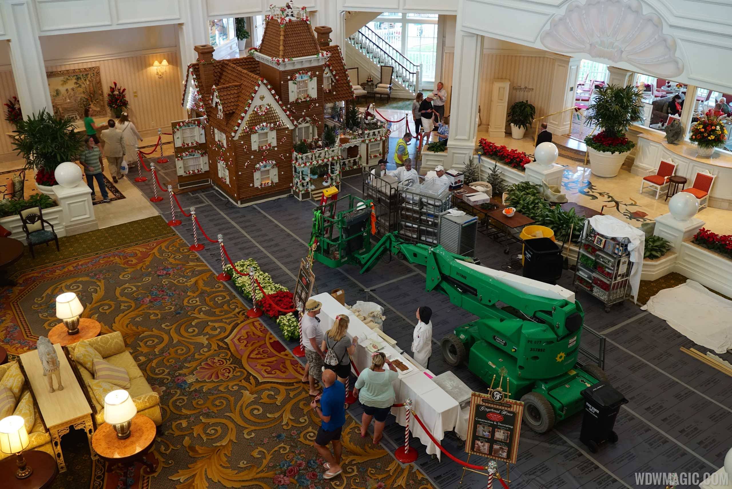 Finishing touches on the Grand Floridian Gingerbread House