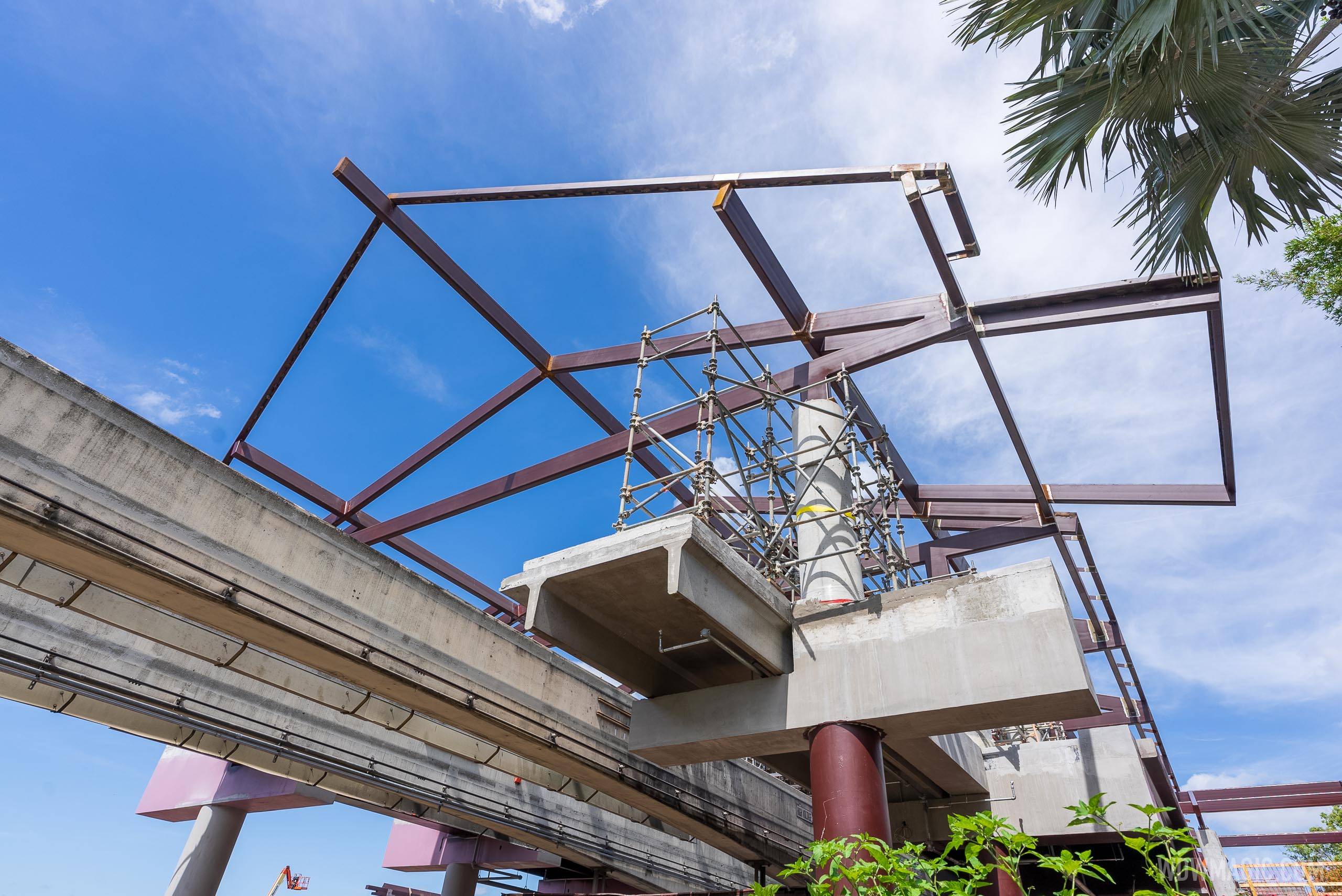The roofline under construction over the monorail station