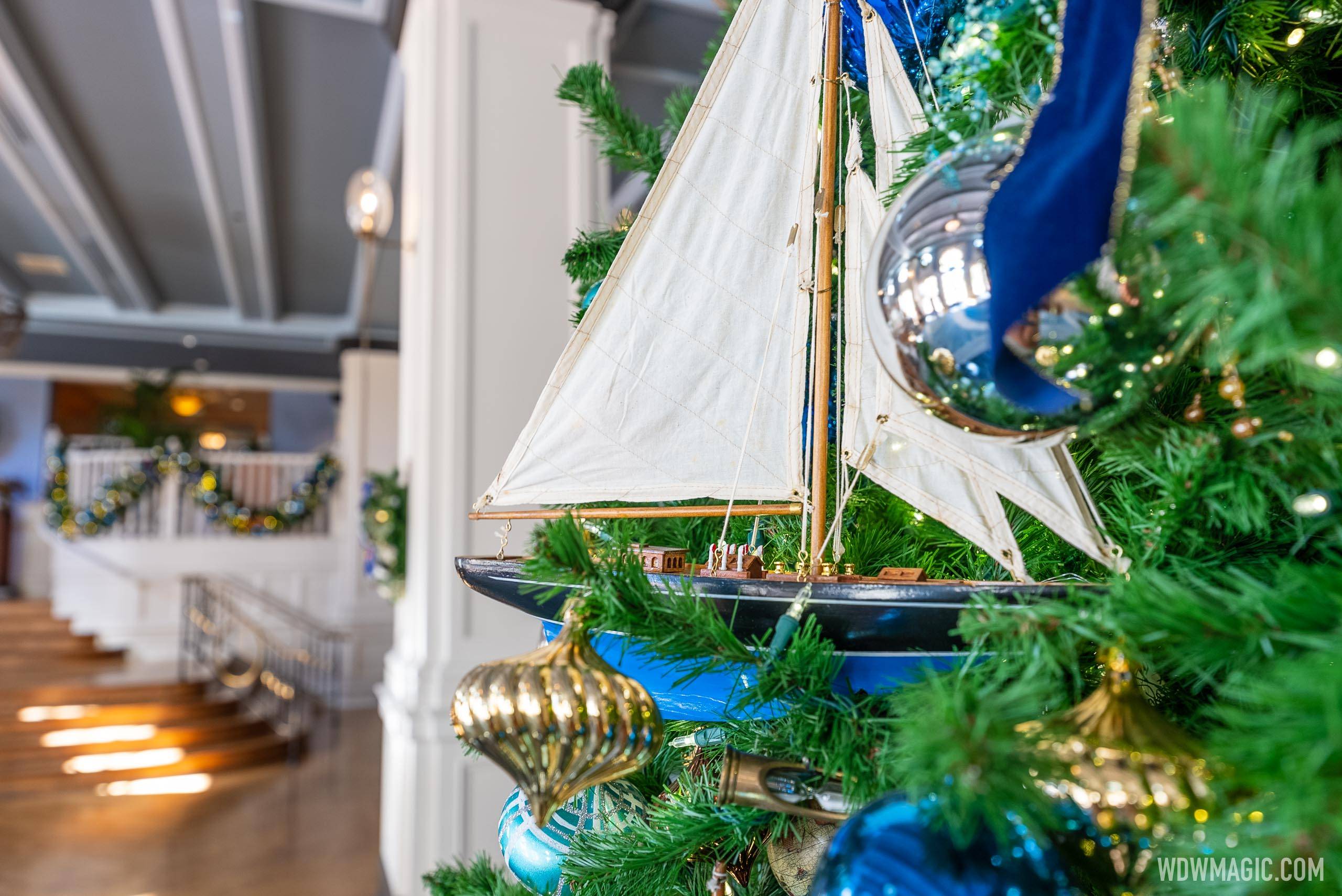The tree is decorated with nautical inspired ornaments