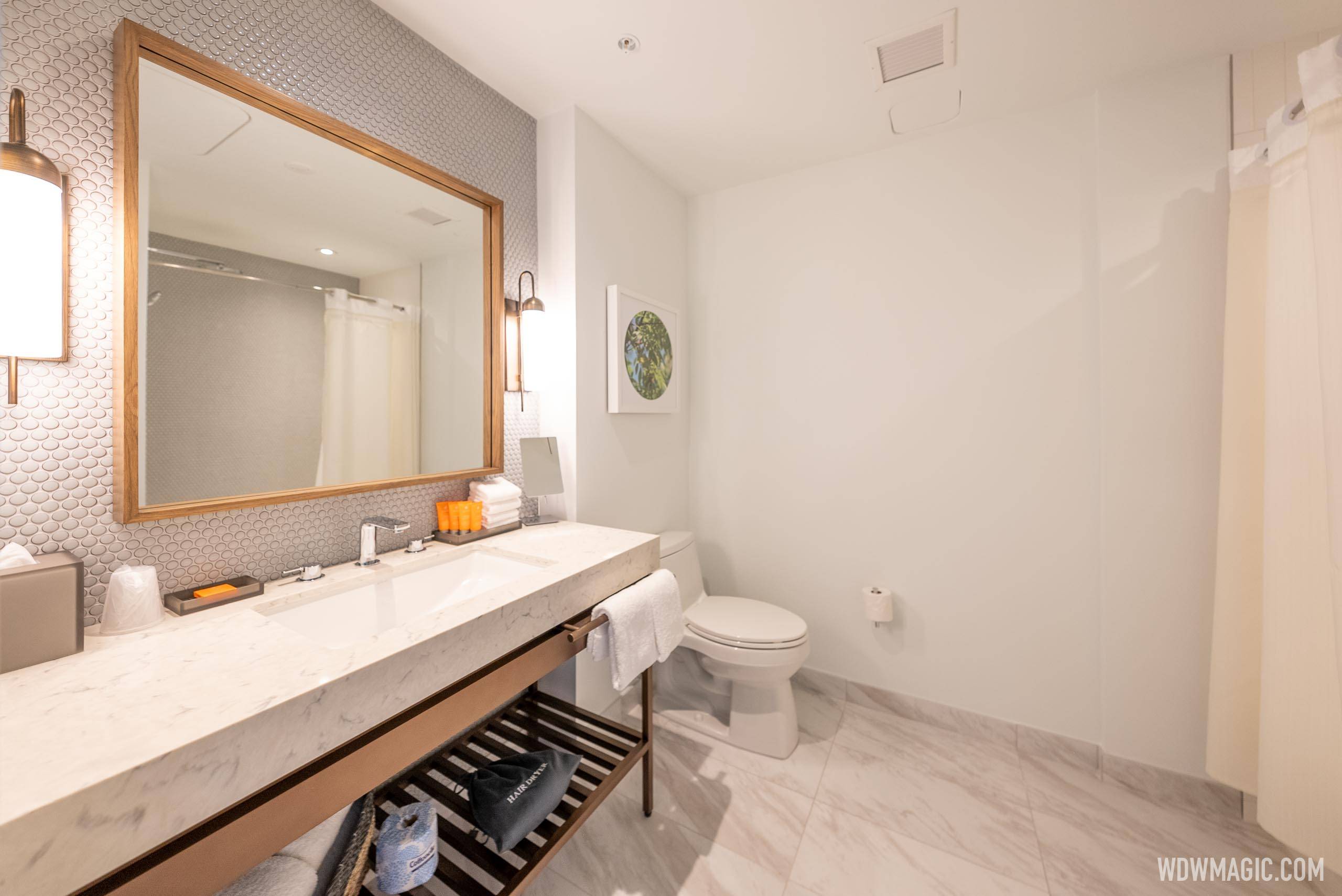 Standard guest room bathroom at Walt Disney World Swan Reserve