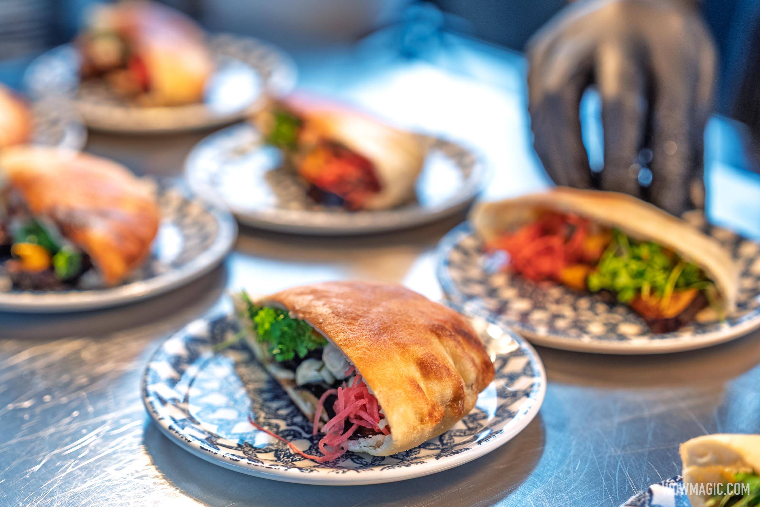 Sabich (Amare) – Fried eggplant with tahini garlic sauce, pickled watermelon radish, and mini pita.