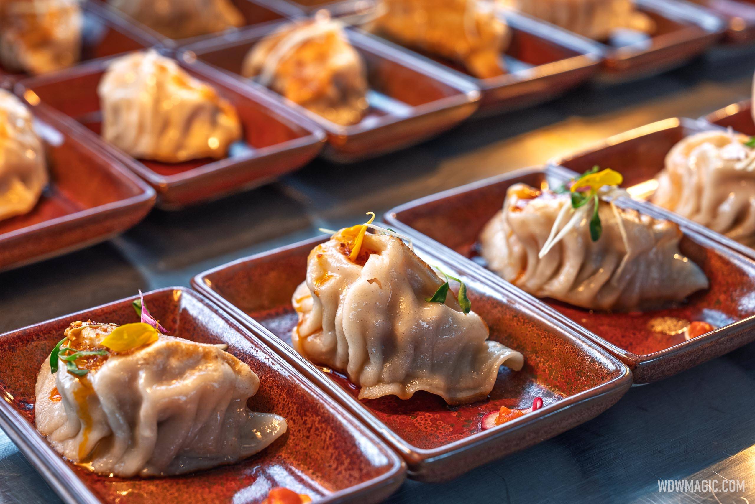 • Pan-Fried Shrimp & Pork Dumplings (Chinatown) – Served with ginger-black vinegar dipping sauce and chili oil.