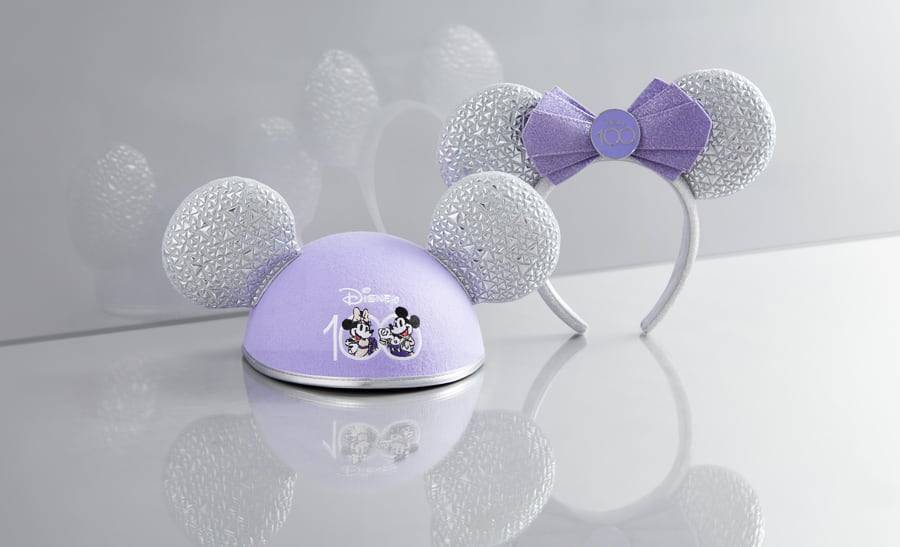  Disney100 Platinum Celebration Mickey Mouse Ear Hat and the Disney100 Platinum Celebration Minnie Mouse Ear Headband.