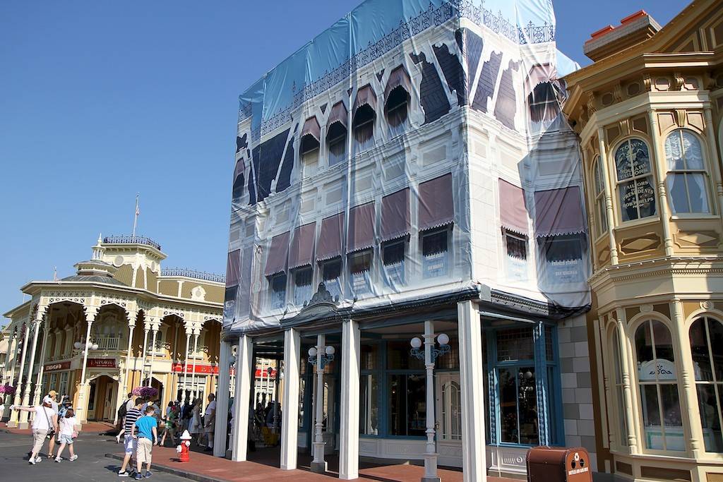 New color scheme revealed as some of the construction scrims come down on the Main Street Confectionary shop