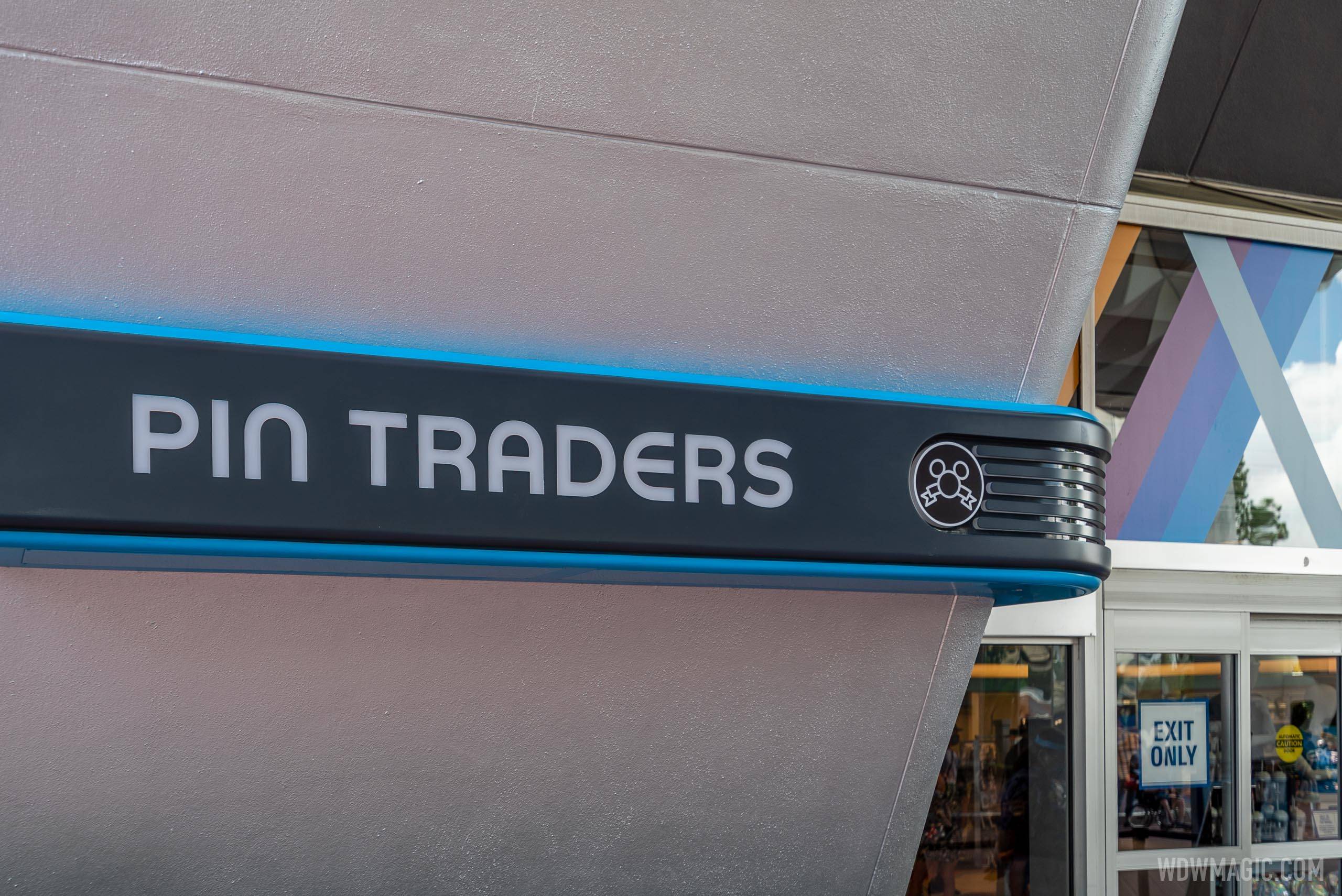 Pin Traders and Camera Center new signs
