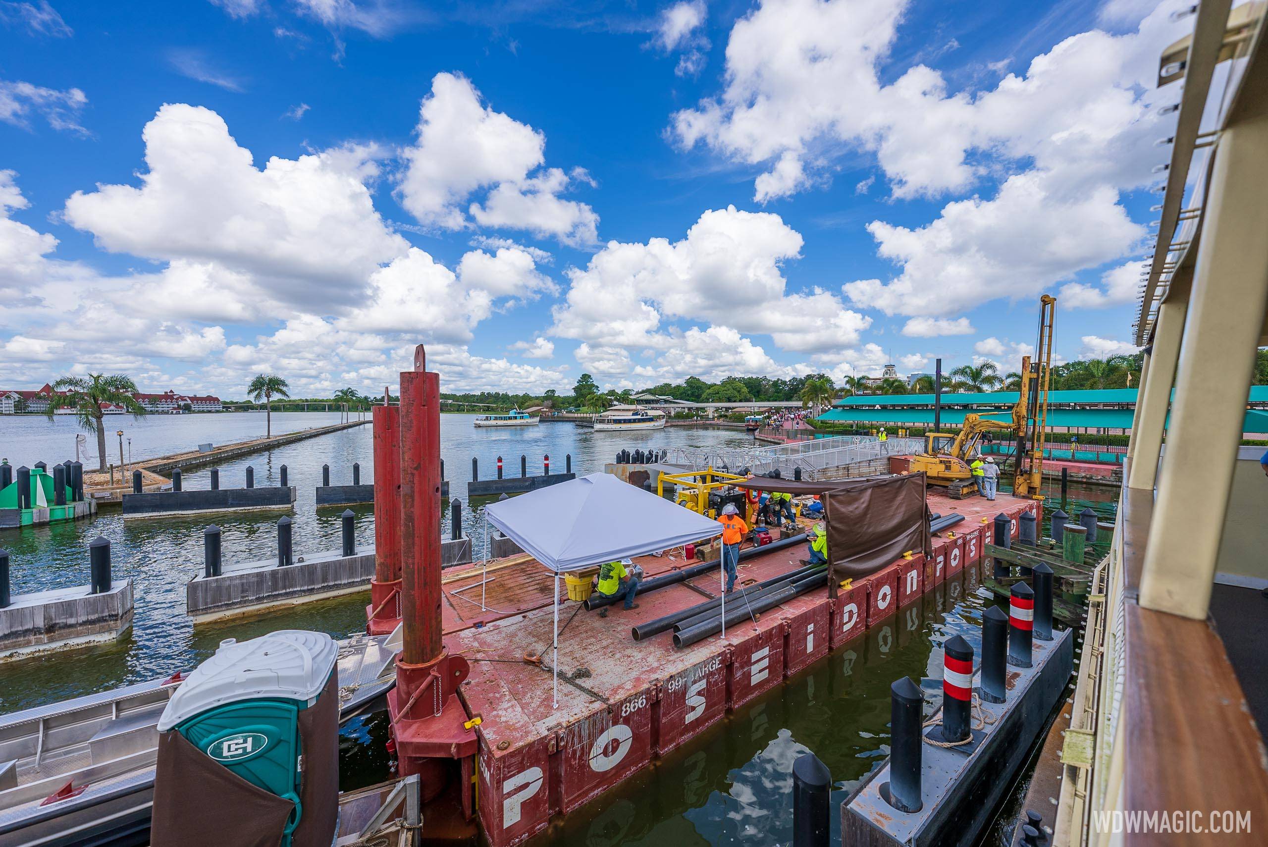 Crews working on the Magic Kingdom Ferry Boat dock installing new pilings
