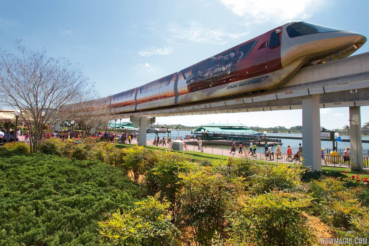 Iron Man 3 wrapped Monorail Black heading into the Magic Kingdom station on the Express beam
