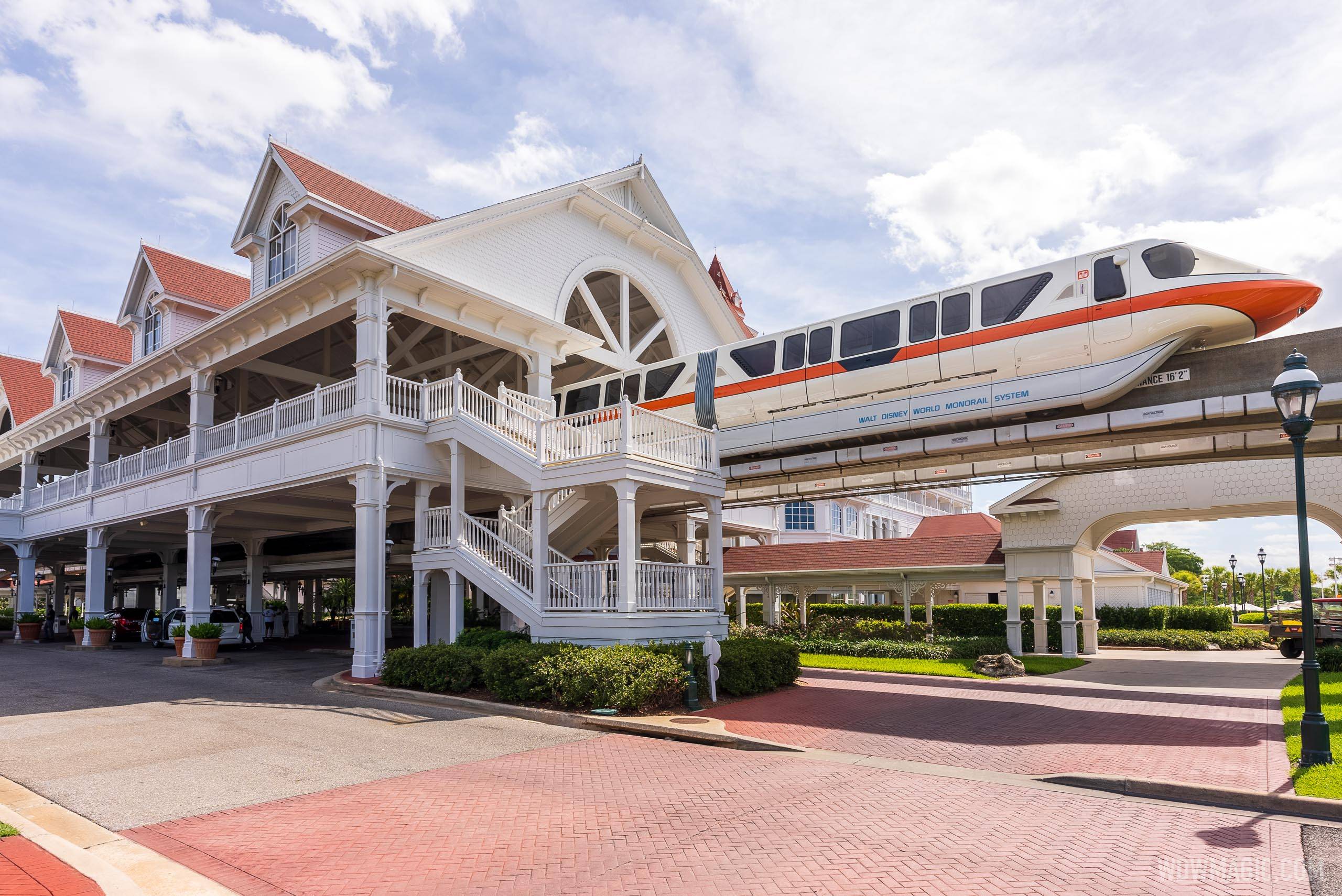 Monorail Orange on the Express Beam exits the station at Disney's Grand Floridian Resort