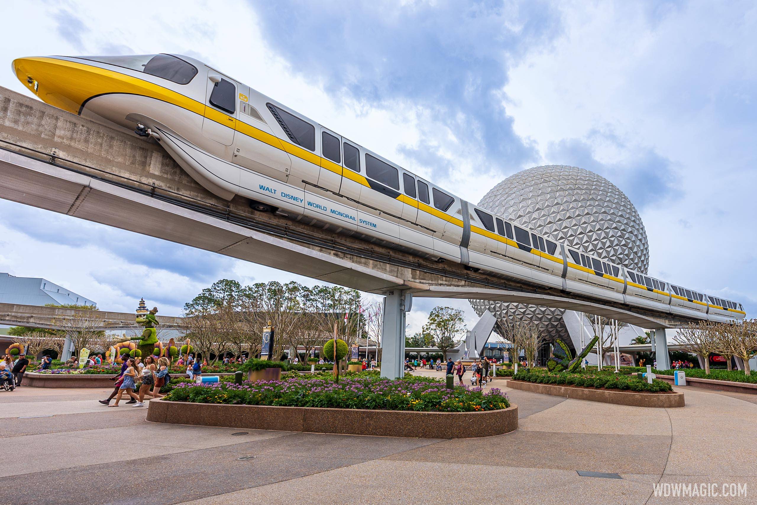 Refurbished Monorail Yellow on the EPCOT Beam at the main entrance