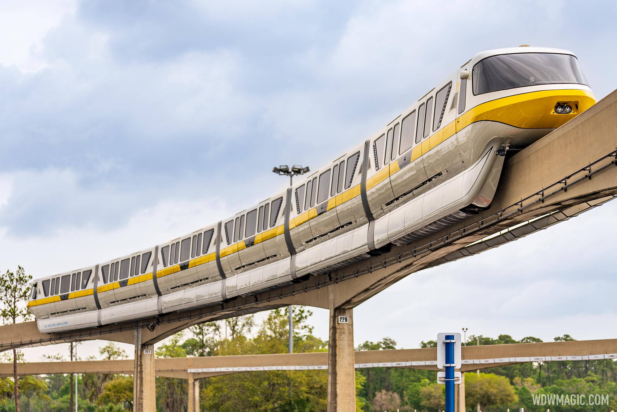 Refurbished Monorail Yellow on the EPCOT Beam leaving the EPCOT station