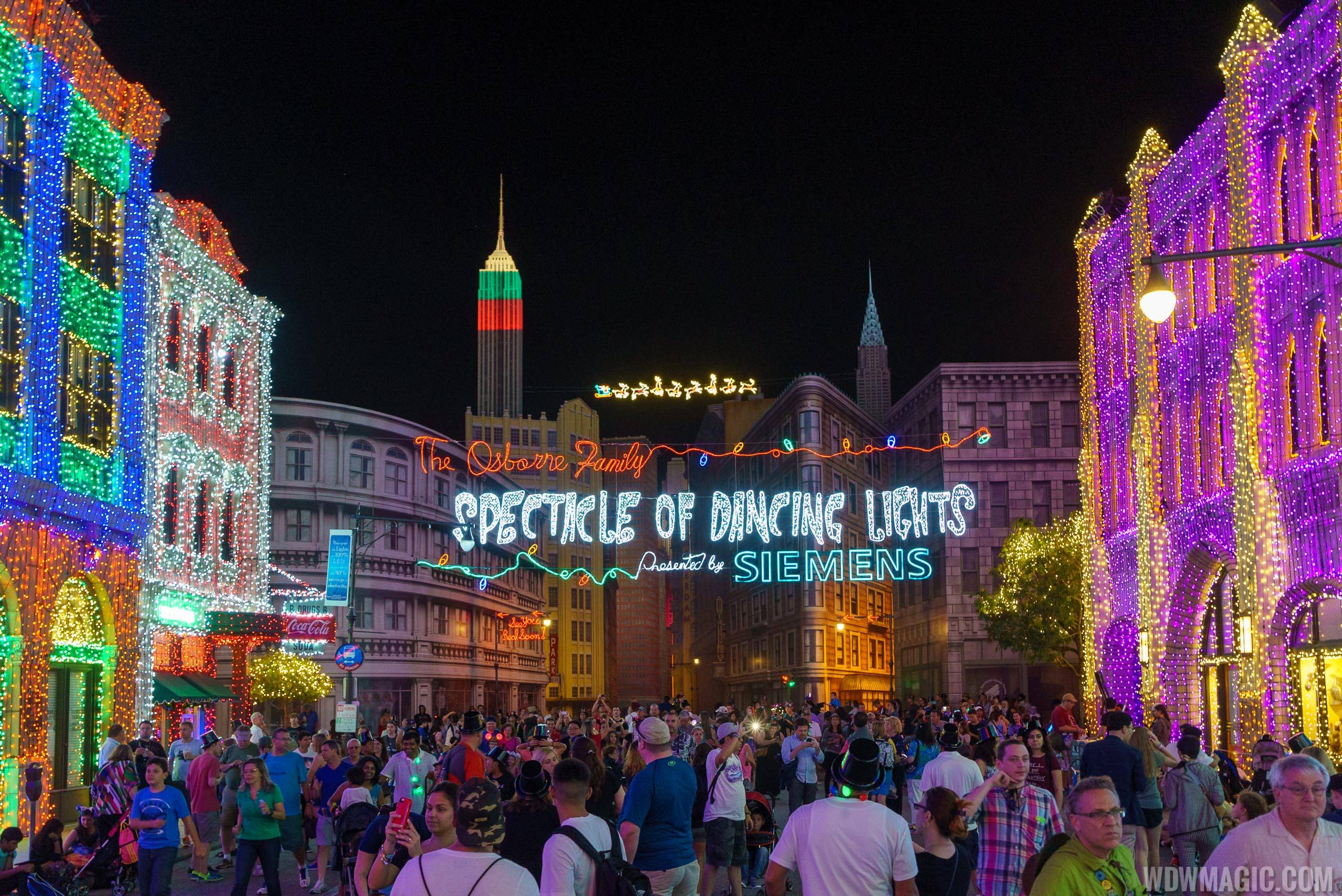A packed Streets of American enjoys the Osborne Family Spectacle of Dancing Lights