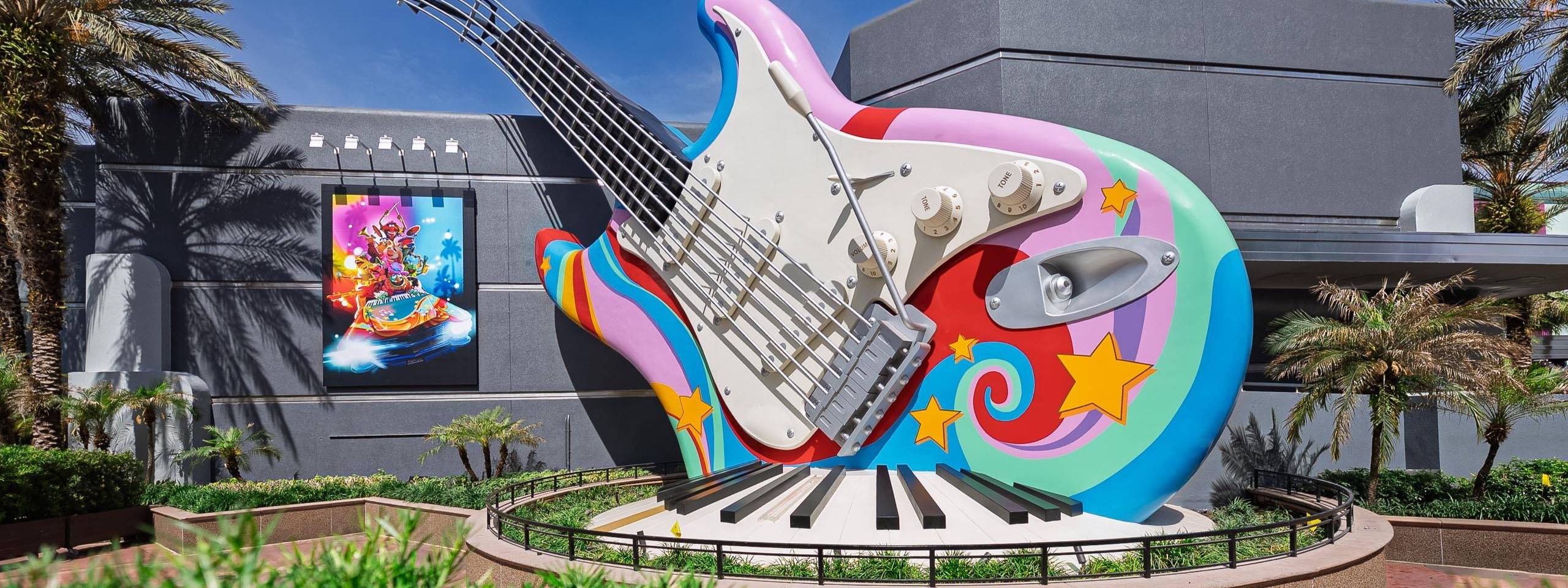 Muppets Poster Installed at Rock 'n' Roller Coaster as Exterior Nears Completion